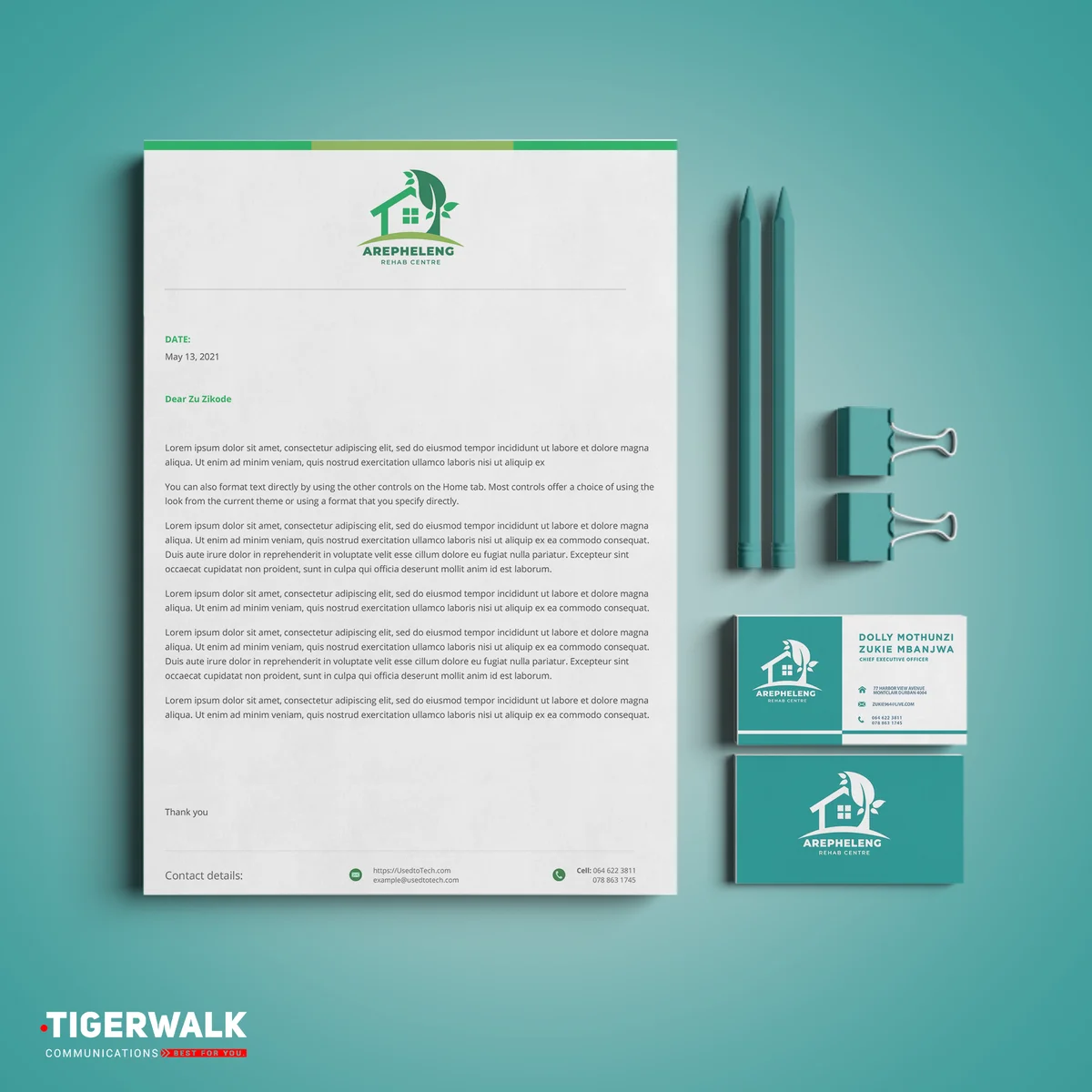 Coordinated letterhead, business cards and stationery with a green house logo.